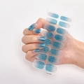 Blue to silver glitter gradient nail sticker style CS-047 on a manicured hand - Sea Blue Gradient Glitter (CS-047)