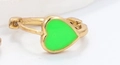 Golden huggie hoop earring featuring a bright green enamel heart pendant for women - Green