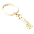 Detail of cream PU leather bracelet keychain with gold tassel and round metal pendant - Off White
