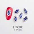 Amuletos para uñas de cristal azul oscuro marquesa con pedrería de colores - Azul Real Marquise Base Plateada con Borde de Colores (5687)