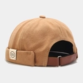 Detail of khaki canvas docker hat featuring brown leather strap and metal buckle closure - Adjustable / Khaki (NH Label)