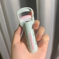 Portable light green eyelash curler with pink rubber pad and ergonomic push button design - Green