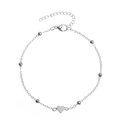 Flat lay of a silver bead chain anklet with a heart pendant and lobster clasp detail - Beaded Heart Silver