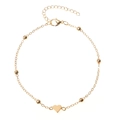 Close-up of golden bead chain anklet with heart pendant and lobster clasp detail - Beaded Heart Gold