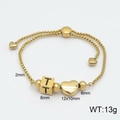Gold-tone adjustable heart bracelet with cube pendant and engraved letter T - Letter T