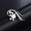 Silver flower brooch with central white pearl and sparkling rhinestones on black stand - Silver Petal Pearl