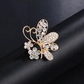 Elegant gold butterfly brooch with clear crystals and sparkling flower accents - Gold Pave Butterfly