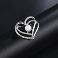 Silver hollow heart-shaped brooch with inlaid rhinestones and a white center pearl - Silver Double Heart Pearl
