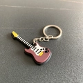 Cartoon electric guitar keychain in maroon PVC finish with silver metal ring - Electric Guitar