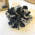 Oversized retro scrunchie featuring black and white feather prints on premium chiffon - Leaf Black
