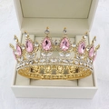 Detailed view of baroque gold crown with pink teardrop gems in a jewelry box - Gold Base Pink Rhinestone + White Rhinestone