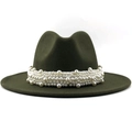 Detailed texture of dark green wool felt hat with decorative white pearl band - Green
