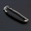 Detail of beaded men's bracelet featuring matte black stones and stainless steel chain - Black Agate
