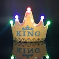 Macro shot of yellow LED King crown party hat with colorful lights on black background - One Size / Yellow King Crown Hat