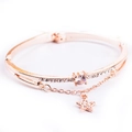 Elegant rose gold star charm bracelet with double-layer pavé crystals on white background - Single Star Bracelet