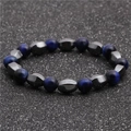 Dettaglio delle perle occhio di tigre blu ed ematite con texture metalliche sfaccettate - Ematite Sfaccettata Occhio di Tigre G