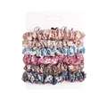 Detail of 6-piece floral scrunchie set with various patterns on a white display card - Printed Pattern Set