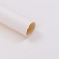 Close-up of a thick white paper tube for flower wrapping materials and posters - Cream