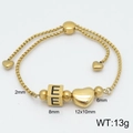 Gold adjustable box chain bracelet with heart charm and letter E cube bead detail - Letter E