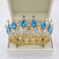 Detail of baroque gold bridal crown with blue teardrop crystals in a beige gift box - Gold Base Lake Blue + White Rhinestone