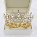 Close-up of golden Baroque bridal crown with pear-shaped rhinestones in a gift box - Gold / White Zirconia