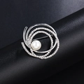 Silver-toned interlinked ring brooch with sparkling rhinestones and a central pearl - Silver Ring Pearl