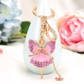 Pink rhinestone ballet fairy keychain with gold metal wings and lobster clasp detail - Pink