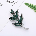 Macro view of vintage leaf brooch with deep green rhinestones and silver alloy plating - 1# Retro Leaf