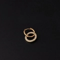 Polished gold earrings with pavé cubic zirconia accents on a black leather background - Double Hoop Set Style (341-4#)