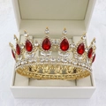 Detailed view of a gold bridal crown with red teardrop stones in a jewelry box - Gold Base Bright Red + White Rhinestone