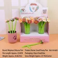 Close-up of creative plush flower pens in a pink cat paw holder with premium gift box - Small Peony-Black Ink
