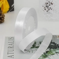 Single roll of 1.5cm wide white satin ribbon with silky gloss for gift wrapping - White