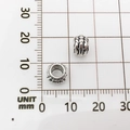 Macro shot of silver alloy elephant spacers showing 10mm height on a metric measurement board - Large Hole Spacer (10146)