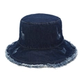 Close-up of distressed denim bucket hat featuring frayed edges and vintage ripped details - M (56-58cm) / Dark Blue
