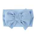Close-up view of a light blue textured fabric baby headband featuring a large bow detail - Pre-tied Bow / Light Blue