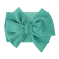 Macro detail of a mint green waffle textured fabric bow headband for babies and kids. - Pre-tied Bow / Mint Green Marble