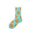 Blue cotton crew socks with orange smiley face flower pattern on a white background - One Size / Green