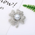 Detailed view of silver four-leaf clover brooch with white crystals and grey pearl - 24# Silver Four Leaf Clover