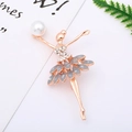 Detailed macro view of a rose gold ballerina brooch with pearl and grey crystals - 17# Ballet Dancer