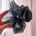 Elegant large black pearlescent organza scrunchie with a shimmering textured finish - Oversized / Black