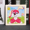 Educational wooden 9-piece puzzle for kids featuring a cute pink cartoon rabbit design - Rabbit