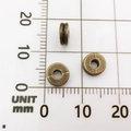 Three antique bronze saucer beads with groove details shown on a millimeter ruler - Striped Bead (10147)