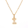 Detailed view of gold-plated letter I pendant featuring micro-paved sparkling crystals - Letter I