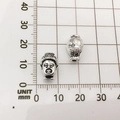 Macro detail of silver Buddha-shaped alloy beads with dimensions on a metric scale - Buddha Head (10155)