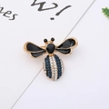 Close-up of a bee brooch with gold finish, blue rhinestones, and black enamel wings - 6# Gold Bee