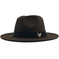 Detail of dark brown fedora wool hat featuring a black ribbon and gold eagle badge - Adjustable / Coffee