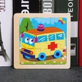 Educational 9-piece wooden puzzle for children featuring a colorful cartoon ambulance - Ambulance