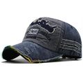 Close-up of distressed denim baseball cap with Shark embroidery and 1969 patch - Navy Blue and Grey