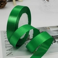 Roll of 2cm emerald green satin ribbon for gift wrapping and wedding cake decoration - Green