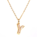Macro detail of gold-plated letter Y pendant necklace with micro-pave zirconia stones - Letter Y